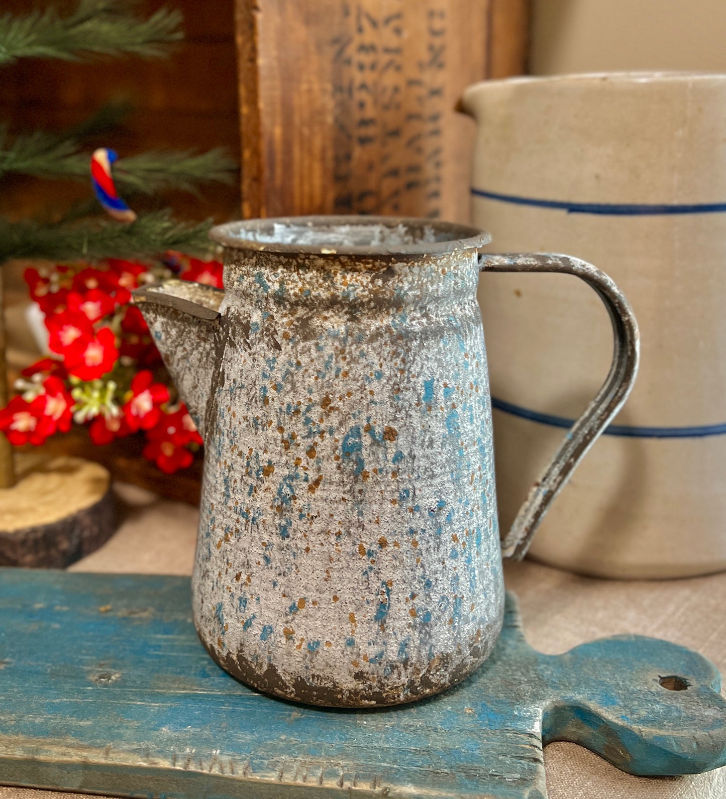 Aged metal pitcher