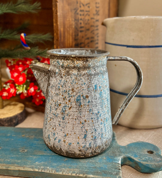 Aged metal pitcher